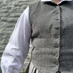 Ladies wool waistcoat in checkboard weave wool with pink polka dots
